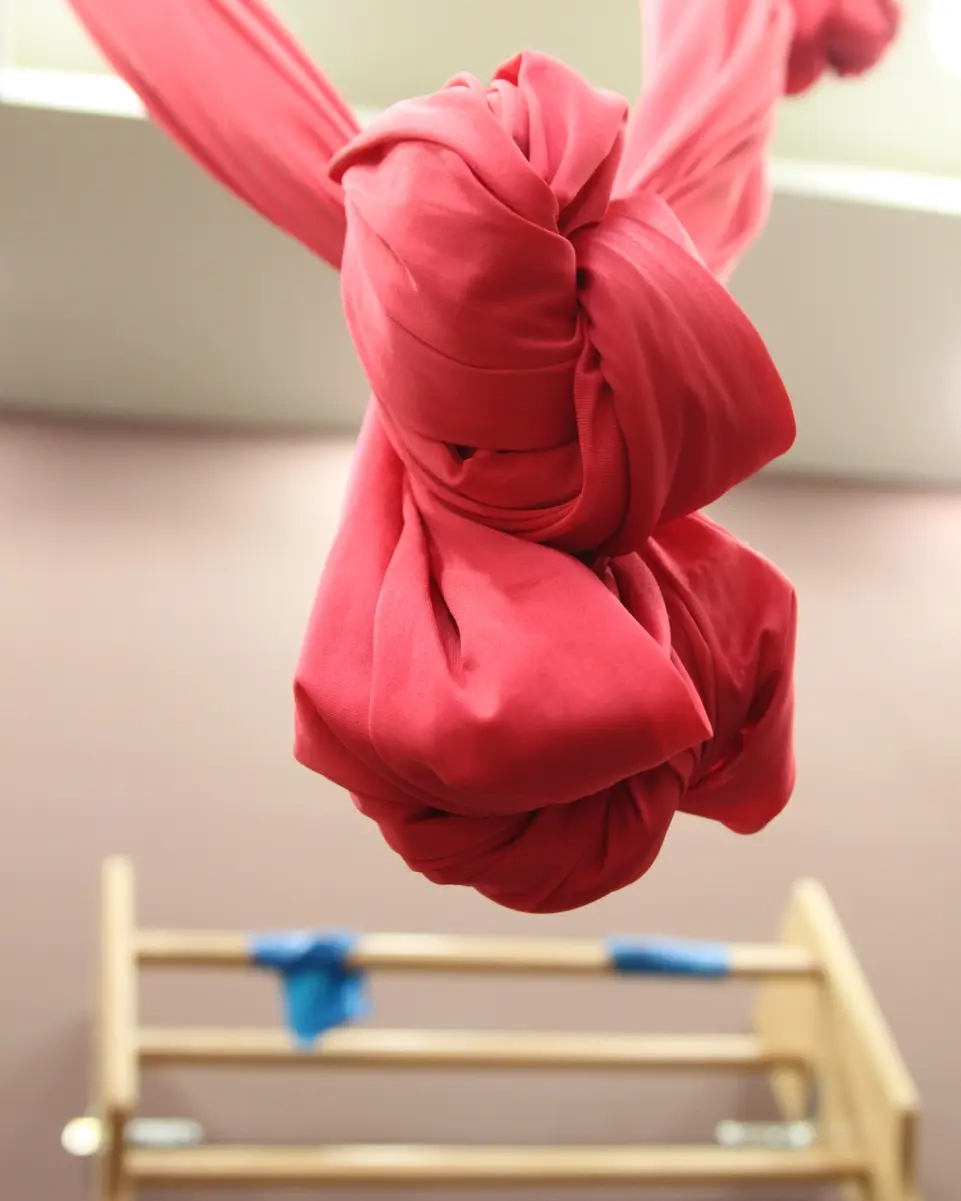 A red aerial silk